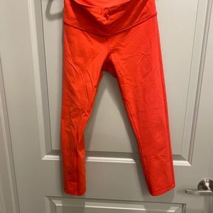 Lululemon red orange leggings.